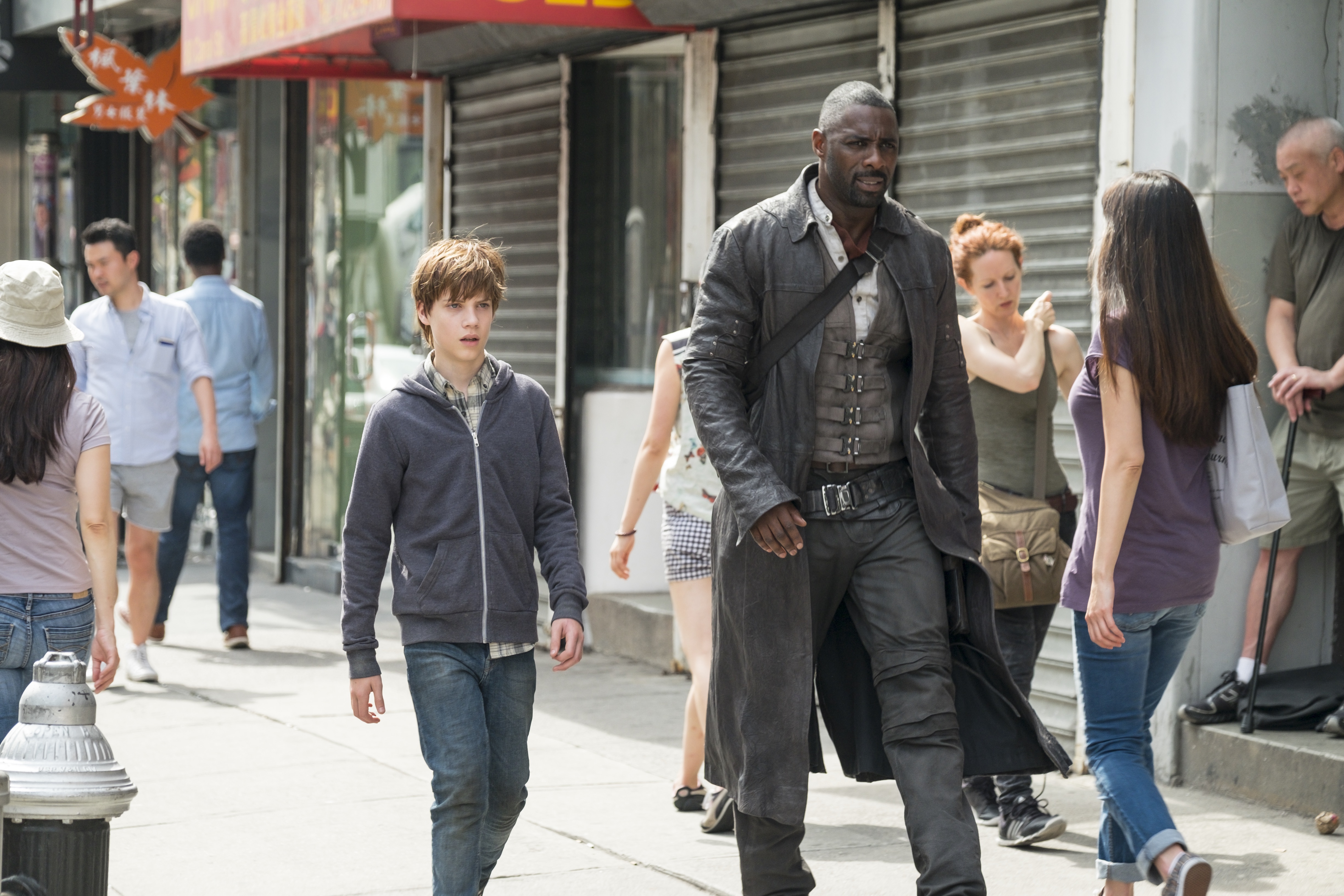 Jake Chambers (Tom Taylor) and Roland (Idris Elba) in Columbia Pictures' THE DARK TOWER.